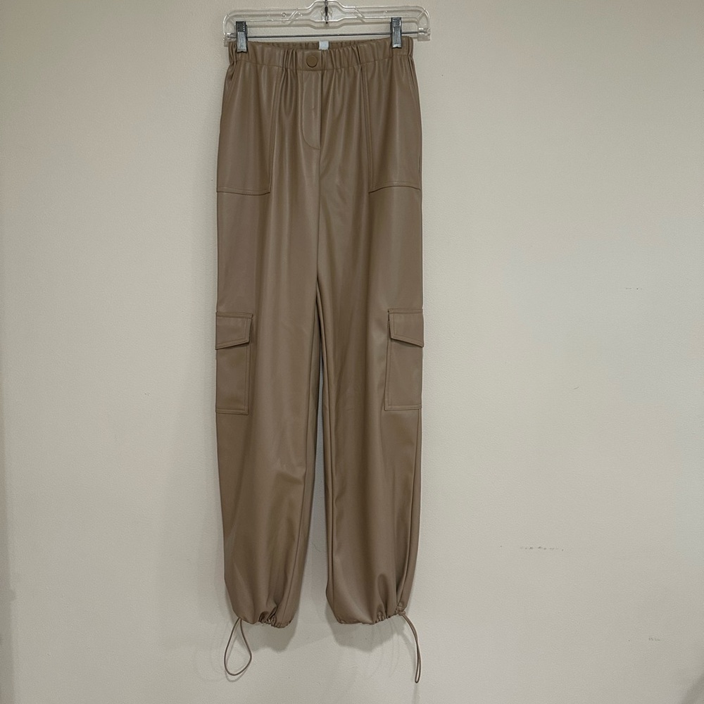 Women’s and now this faux leather high waisted cargo pocket joggers. Siz…